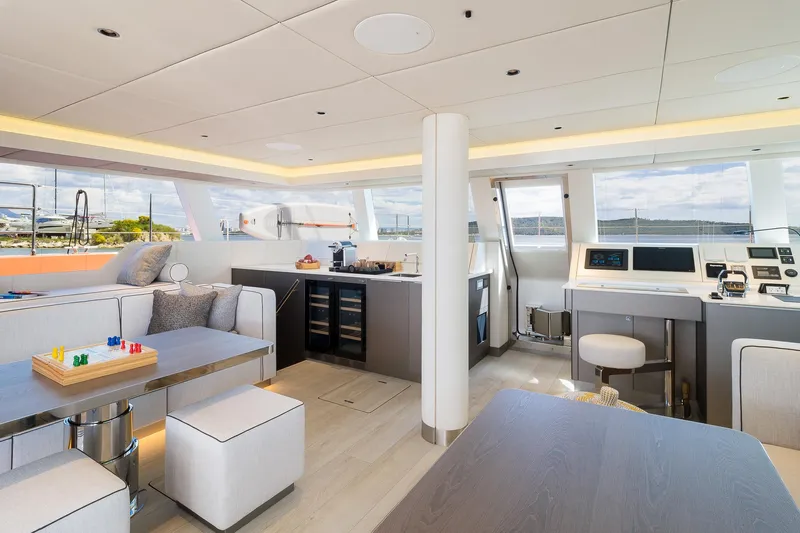Blessed Yacht Photos Pics Luxurious interior of 2024 Sunreef 50 A yacht with modern design and panoramic windows.
