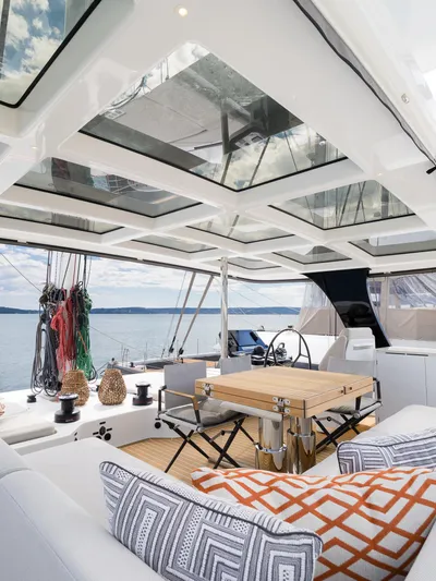 Blessed Yacht Photos Pics Luxurious Sunreef 50 A yacht interior with modern design and panoramic windows, 2024 model.