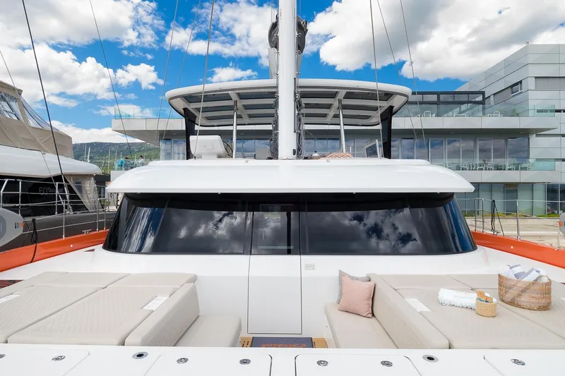 Blessed Yacht Photos Pics Luxurious 2024 Sunreef 50 A yacht with spacious deck and modern design.