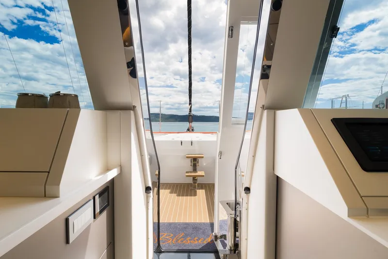 Blessed Yacht Photos Pics Interior view of 2024 Sunreef 50 A yacht, showcasing modern design and ocean view.