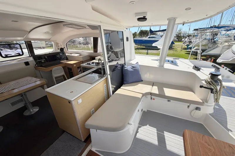Strategery X Yacht Photos Pics Luxurious 2014 Outremer 45 catamaran interior with modern seating and navigation area.
