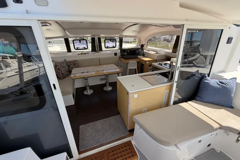 Strategery X Yacht Photos Pics Interior of 2014 Outremer 45 catamaran with modern kitchen and seating area.