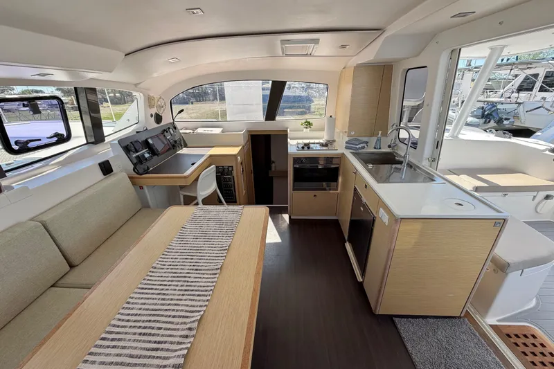 Strategery X Yacht Photos Pics Interior of 2014 Outremer 45 catamaran featuring modern kitchen and seating area.
