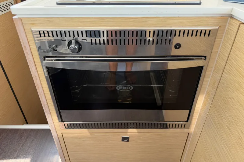 Strategery X Yacht Photos Pics Built-in oven on 2014 Outremer 45 yacht, featuring sleek stainless steel design.