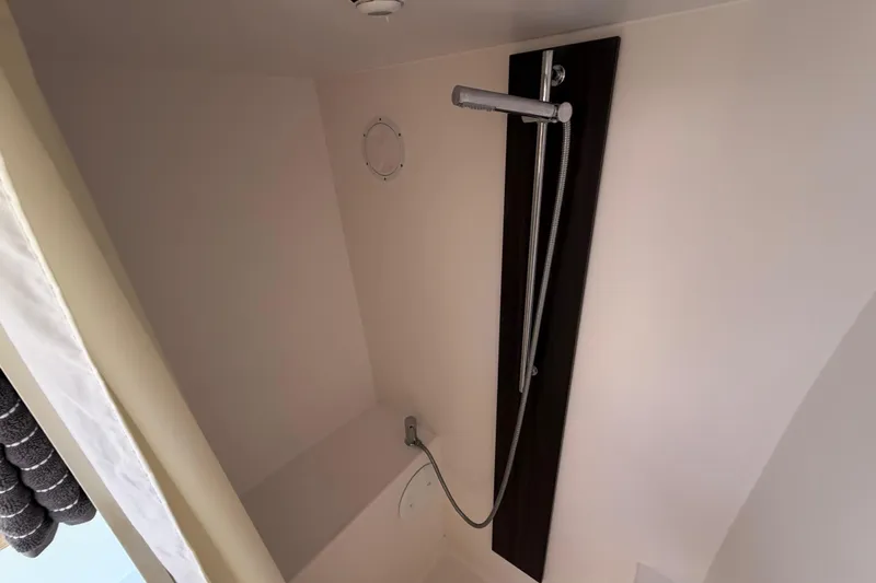 Strategery X Yacht Photos Pics Shower area in 2014 Outremer 45 yacht, featuring modern fixtures and sleek design.