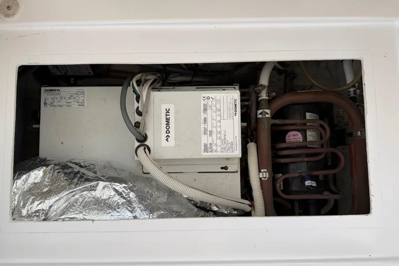 Strategery X Yacht Photos Pics Dometic unit in 2014 Outremer 45 yacht, showcasing electrical and plumbing components.