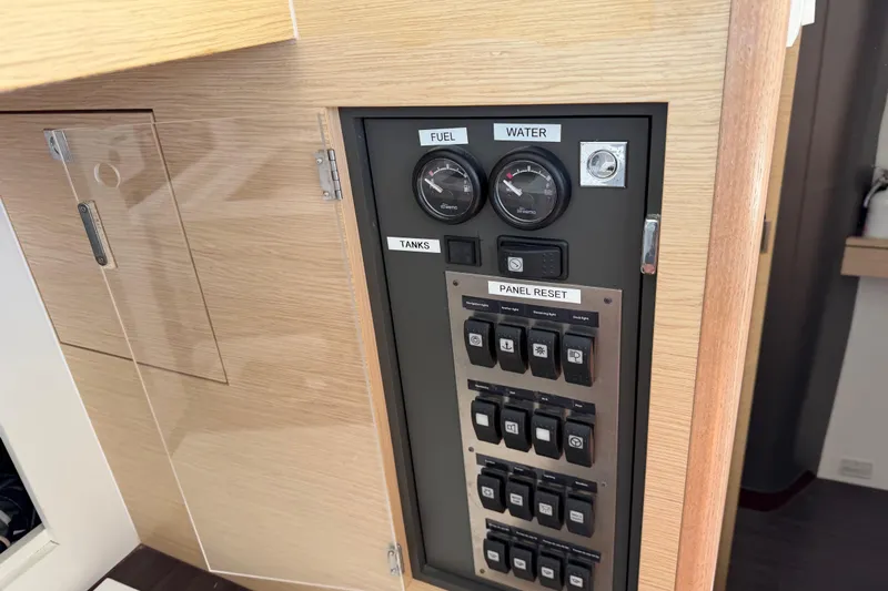Strategery X Yacht Photos Pics Control panel of a 2014 Outremer 45 yacht, featuring fuel and water gauges.