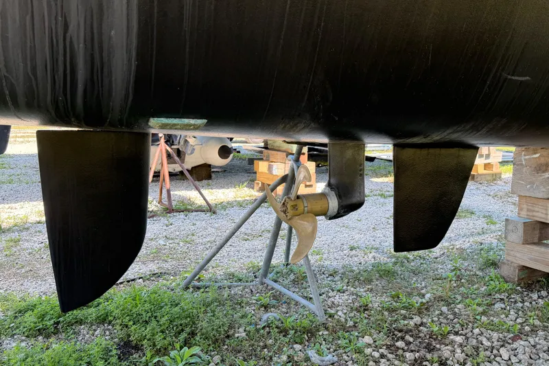 Strategery X Yacht Photos Pics Outremer 45 catamaran hull and propeller, 2014 model, on dry dock.