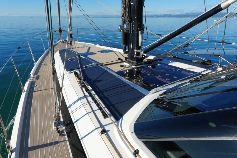  Yacht Photos Pics Sleek 2020 Amel 60 yacht deck with modern design on calm blue waters.