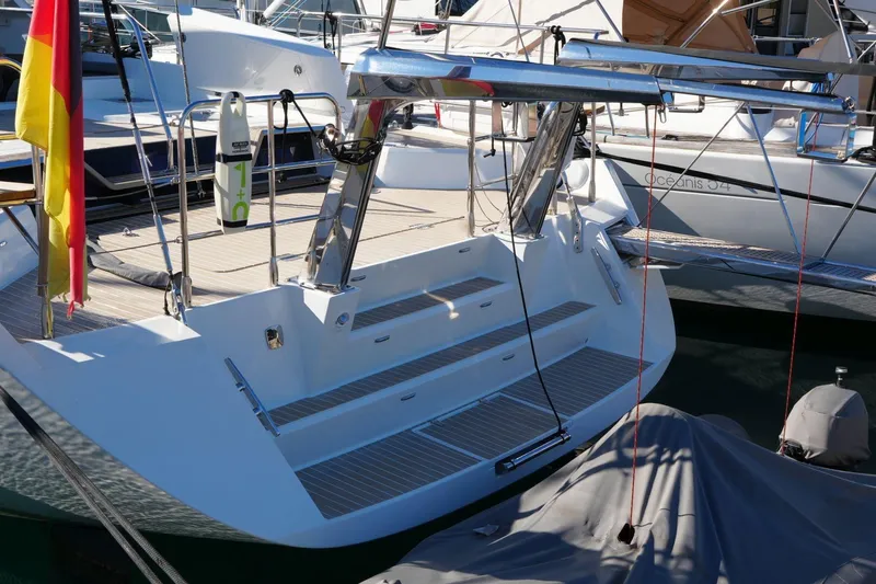  Yacht Photos Pics Sleek 2020 Amel 60 yacht docked, featuring modern design and spacious deck.