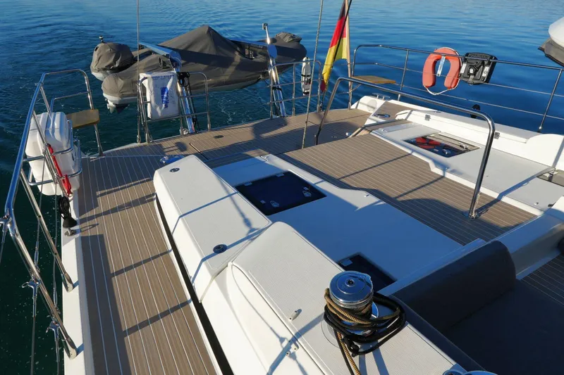  Yacht Photos Pics Deck of 2020 Amel 60 yacht with lifebuoy and German flag.