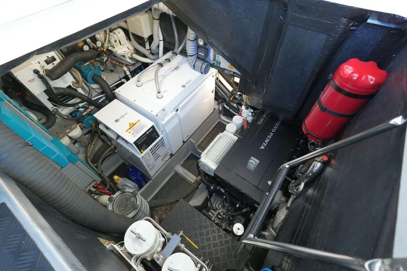  Yacht Photos Pics Engine room of a 2020 Amel 60 yacht, featuring Volvo Penta and Cummins Onan equipment.