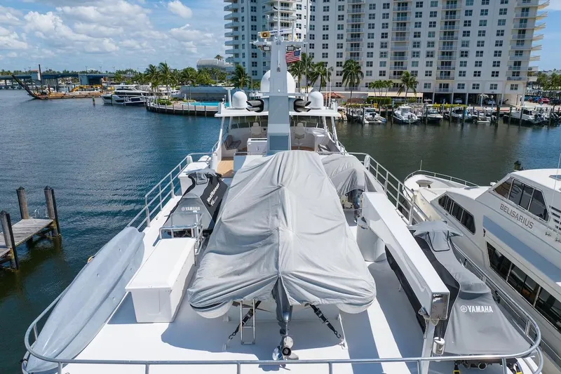 Yacht Photos Pics Luxury yacht ABD 90 Explorer 1996 docked at marina with covered equipment.