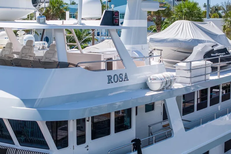  Yacht Photos Pics Luxury yacht "ROSA" docked, featuring sleek design and modern amenities, ABD 90 Explorer 1996.