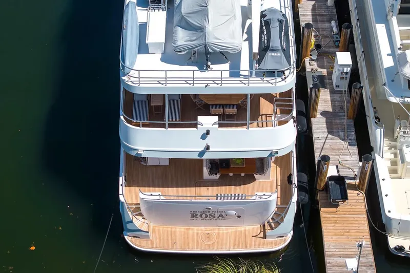  Yacht Photos Pics Aerial view of 1996 ABD 90 Explorer yacht docked at marina.