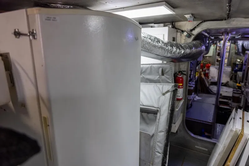  Yacht Photos Pics Interior of a 1996 ABD 90 Explorer yacht, featuring equipment and safety gear.