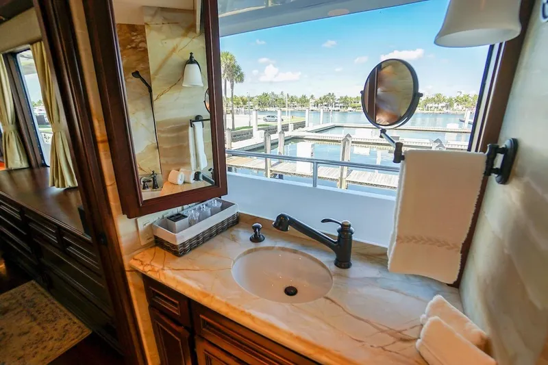  Yacht Photos Pics Luxurious bathroom in 1996 ABD 90 Explorer yacht with marina view.