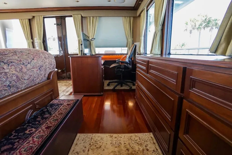  Yacht Photos Pics Luxurious interior of 1996 ABD 90 Explorer yacht with wooden furnishings and elegant decor.