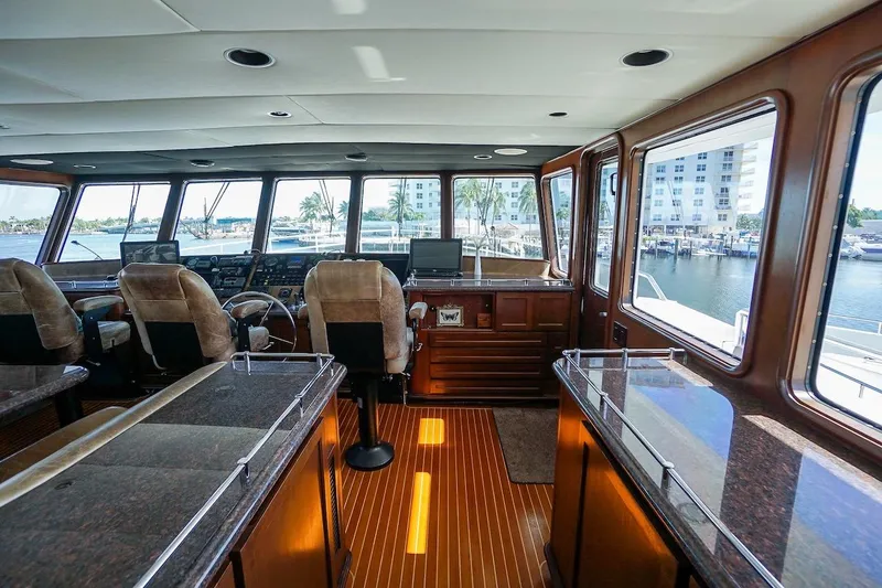  Yacht Photos Pics Interior of 1996 ABD 90 Explorer yacht with panoramic windows and luxurious seating.