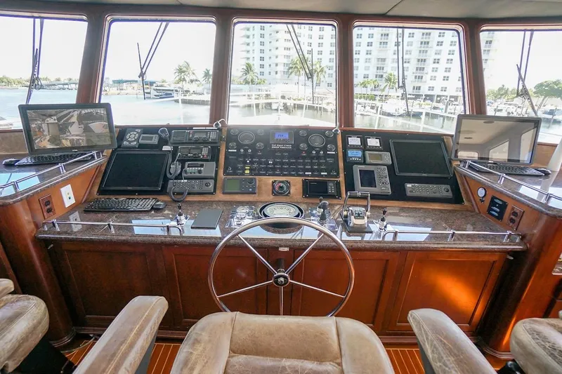  Yacht Photos Pics Bridge of 1996 ABD 90 Explorer yacht with navigation equipment and panoramic windows.