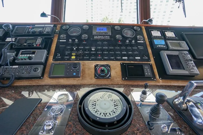  Yacht Photos Pics Bridge control panel of 1996 ABD 90 Explorer yacht with navigation instruments.
