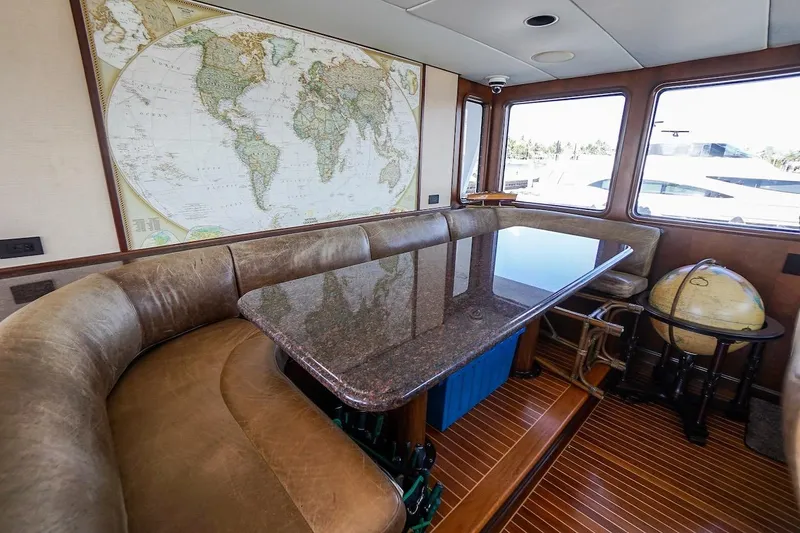  Yacht Photos Pics Luxurious 1996 ABD 90 Explorer yacht interior with map and globe decor.