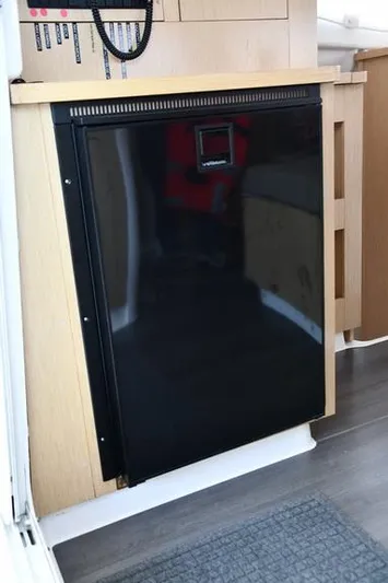 Lil Anna Yacht Photos Pics Compact refrigerator in 2014 Fountaine Pajot Mahe 36 Evolution yacht interior.