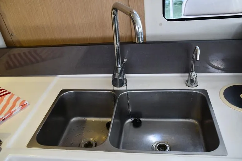 Lil Anna Yacht Photos Pics Double sink in 2014 Fountaine Pajot Mahe 36 Evolution catamaran kitchen.