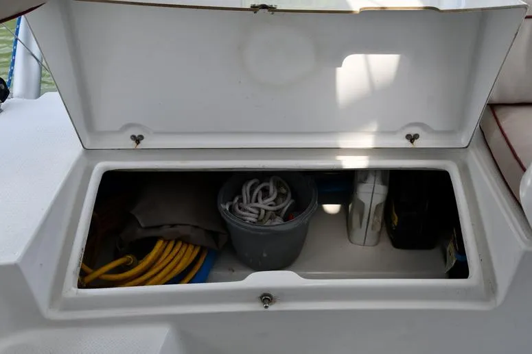 Lil Anna Yacht Photos Pics Storage compartment on 2014 Fountaine Pajot Mahe 36 Evolution catamaran with ropes and equipment.
