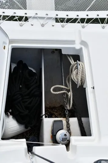 Lil Anna Yacht Photos Pics Anchor locker of 2014 Fountaine Pajot Mahe 36 Evolution catamaran with ropes and chains.