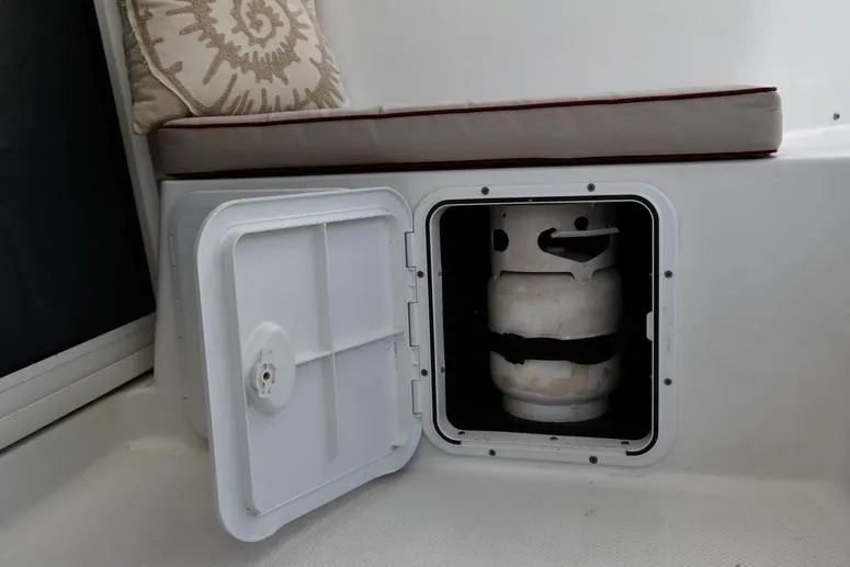 Lil Anna Yacht Photos Pics Storage compartment with propane tank on 2014 Fountaine Pajot Mahe 36 Evolution catamaran.