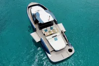 2022 Solaris Power 44 Open yacht on clear blue water, aerial view.