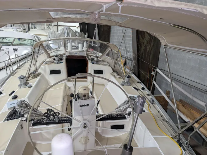 Navicula Yacht Photos Pics 2001 J Boats J/46 sailboat cockpit with steering wheel and navigation equipment.