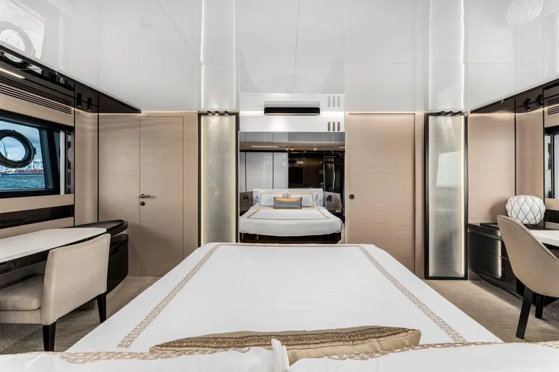 Latitude Yacht Photos Pics Luxurious interior of 2022 Azimut S10 yacht with elegant furnishings and modern design.