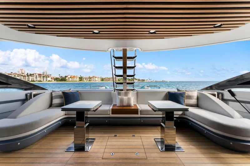 Latitude Yacht Photos Pics Luxurious 2022 Azimut S10 yacht interior with elegant seating and ocean view.
