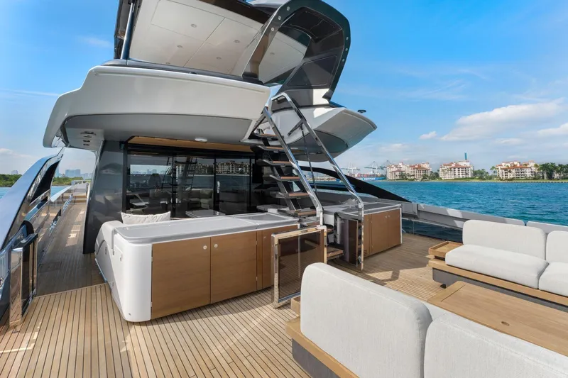 Latitude Yacht Photos Pics Luxurious 2022 Azimut S10 yacht deck with modern seating and ocean view.