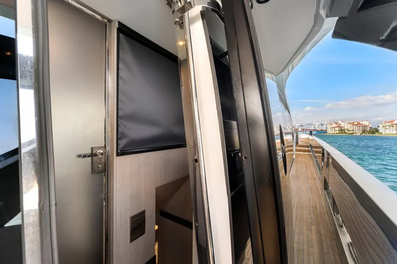 Latitude Yacht Photos Pics 2022 Azimut S10 yacht interior and exterior view with ocean backdrop.