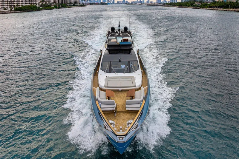 Latitude Yacht Photos Pics 2022 Azimut S10 yacht cruising on open water, showcasing luxury design and performance.