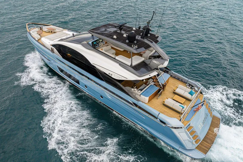 Latitude Yacht Photos Pics Luxurious 2022 Azimut S10 yacht cruising on open sea, showcasing elegant design and spacious deck.