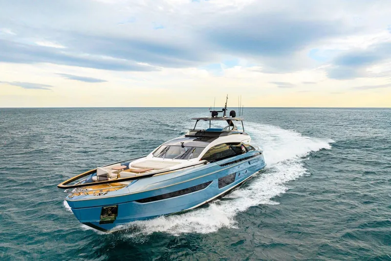 Latitude Yacht Photos Pics Luxury 2022 Azimut S10 yacht cruising on open sea under a cloudy sky.