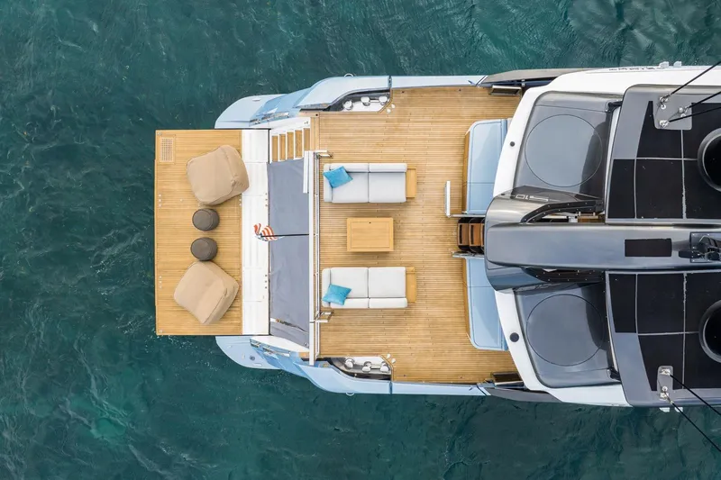 Latitude Yacht Photos Pics Top view of 2022 Azimut S10 yacht with elegant deck and seating area.