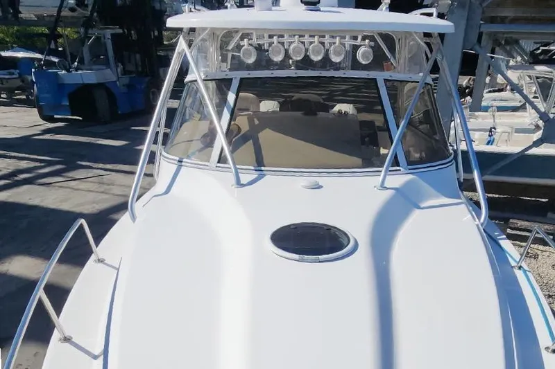  Yacht Photos Pics 2017 Fountain 38 Sportfish Cruiser boat with sleek design and spacious deck.