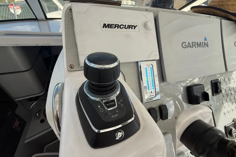  Yacht Photos Pics Control panel of 2017 Fountain 38 Sportfish Cruiser with Mercury and Garmin systems.