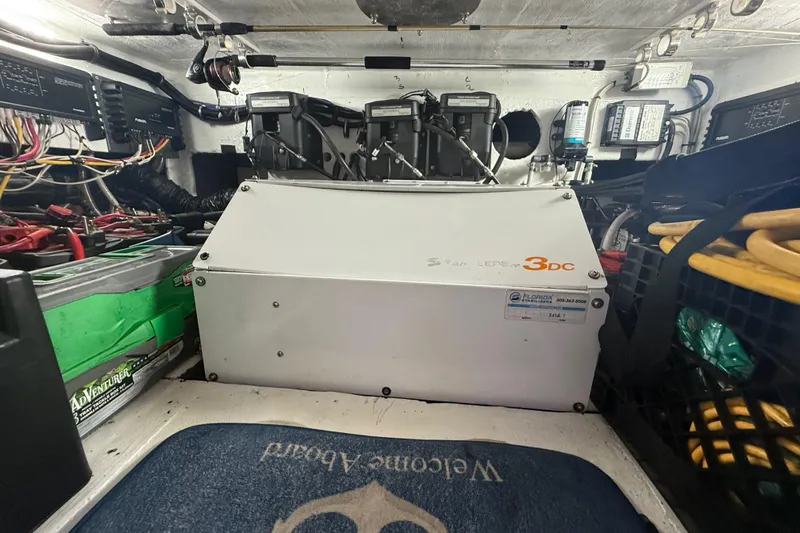  Yacht Photos Pics Engine room of a 2017 Fountain 38 Sportfish Cruiser with electrical components and wiring.