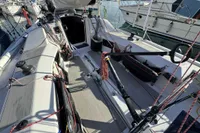 2020 Dehler 30 sailboat cockpit with rigging, docked at marina.