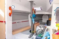 Interior of 2020 Dehler 30 sailboat, featuring compact cabin with storage and seating.