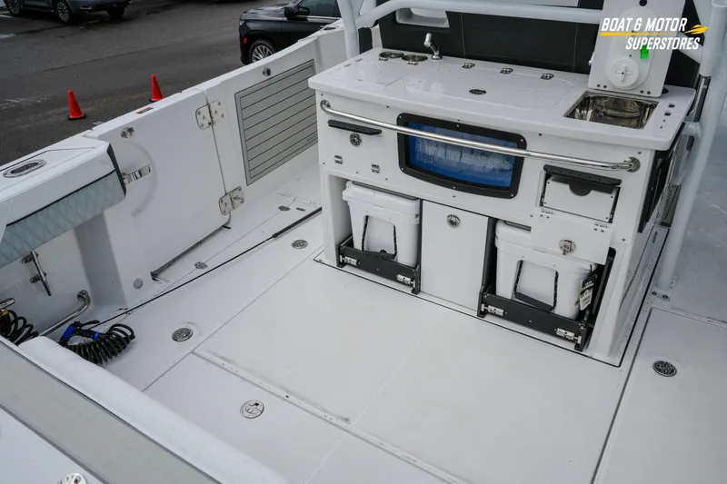  Yacht Photos Pics 2026 Blackfin 332 CC boat deck with storage and utility features.