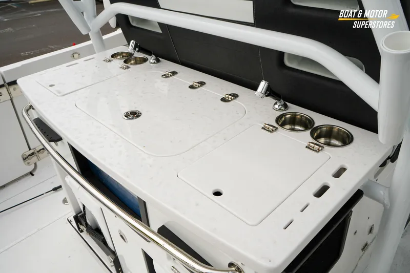  Yacht Photos Pics 2026 Blackfin 332 CC boat's sleek white deck with integrated cup holders and storage.