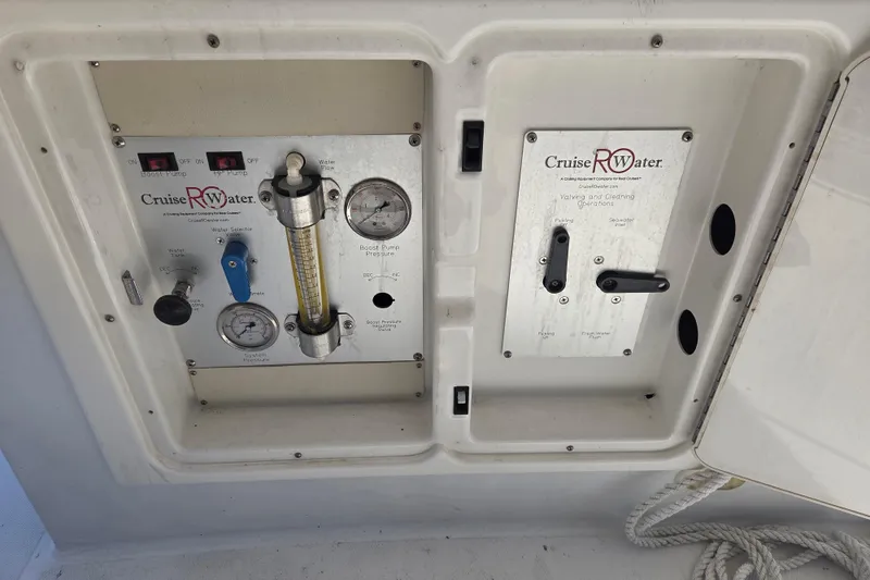 Pier Pressure Yacht Photos Pics Control panel of a 2000 Carver 450 Voyager Pilothouse with Cruise RO Water system.