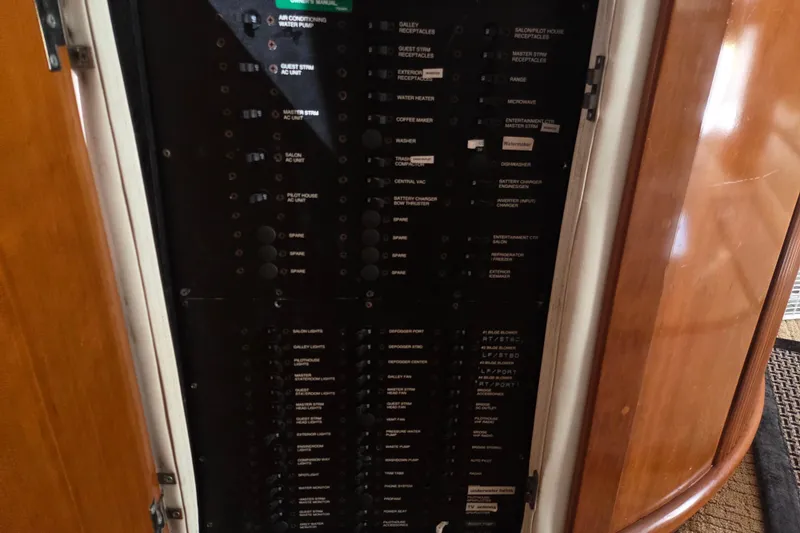 Pier Pressure Yacht Photos Pics Electrical panel inside a 2000 Carver 450 Voyager Pilothouse yacht.